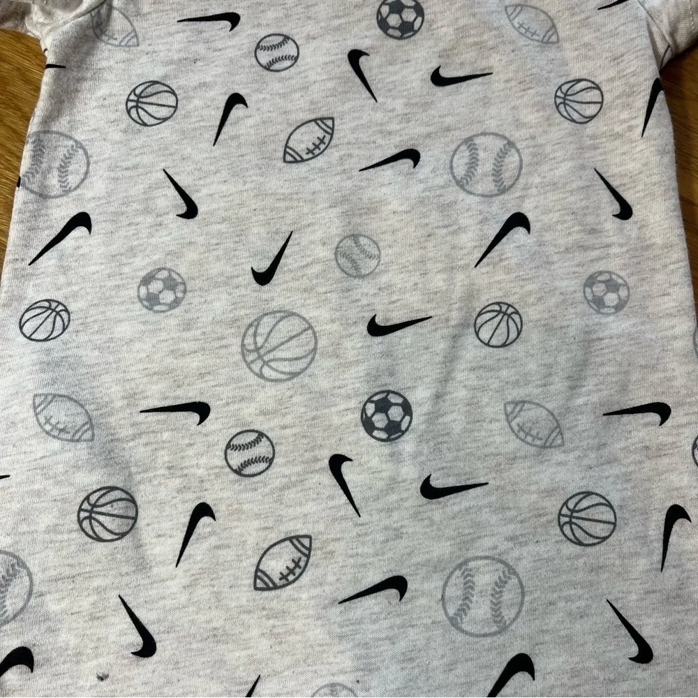 Nike Cream and Black Bodysuit with Short Sleeves and Sports Print